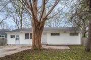Property at 8404 East 105th Street, 