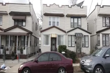 Property at 115-16 142nd Street, 