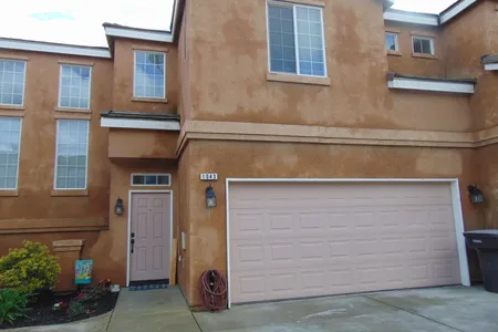 Townhouse for Sale at 1043 Goble Court, Tulare,  CA 93274