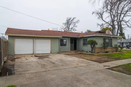 House for Sale at 4611 E Woodward Avenue, Fresno,  CA 93702-4656
