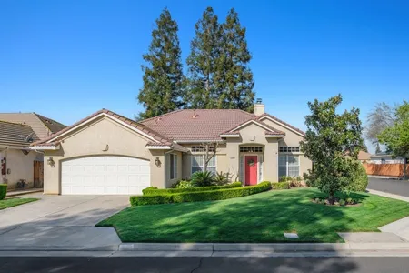 House for Sale at 7563 N Wheeler Avenue, Fresno,  CA 93722-2725