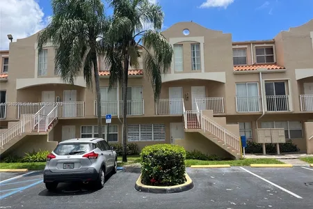 Townhouse for Sale at 8665 Nw 6th Ln #1211, Miami,  FL 33126