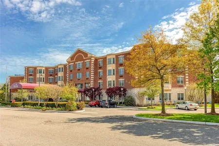 Condo for Sale at 50 Merrick Avenue #407, East Meadow,  NY 11554