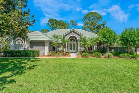 House for Sale at 8520 Redleaf Lane, Orlando,  FL 32819