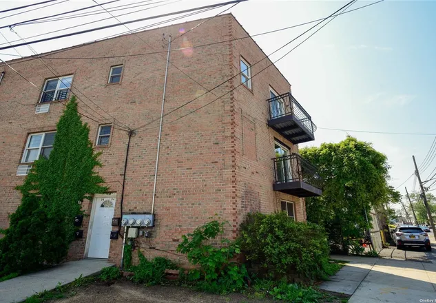 Property at 93-15 75th Street, 