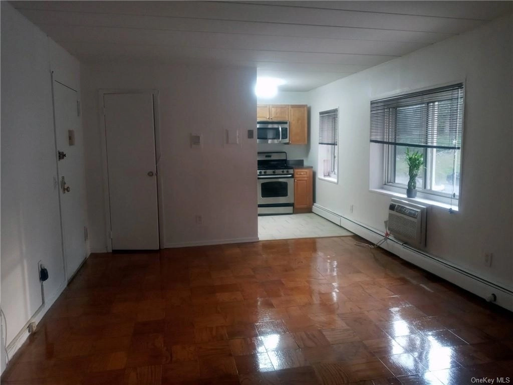 Empty Room, Livingroom at Unit 1G at 2035 Central Park Avenue