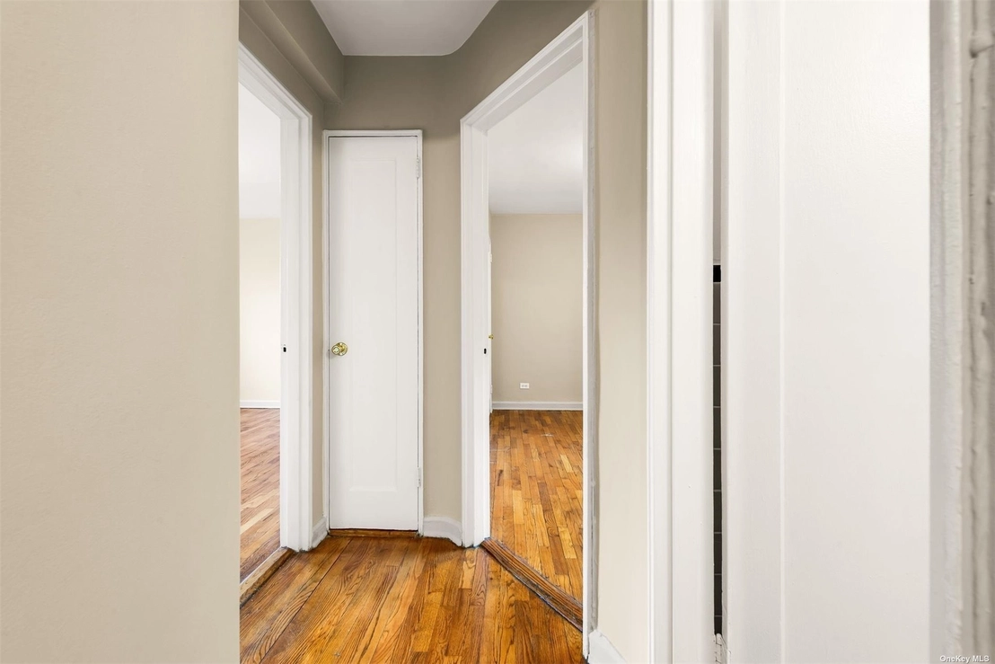Hallway, Empty Room at Unit 4H at 82-39 134 Street