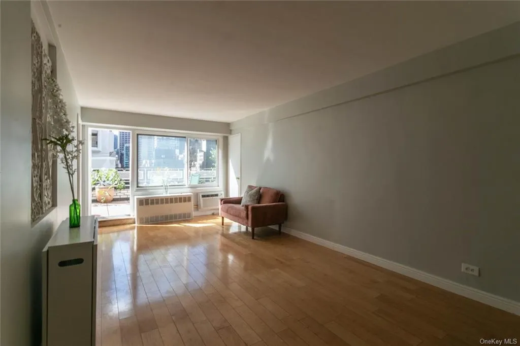 Livingroom, Empty Room at Unit 12B at 240 E 55th Street