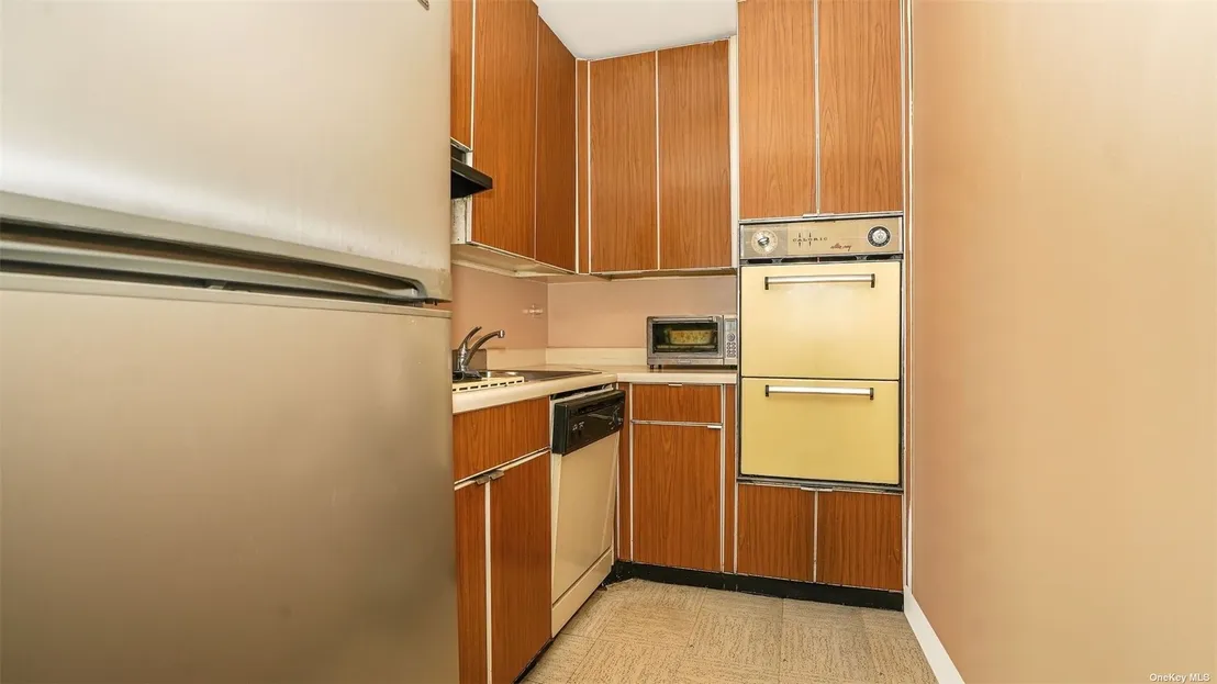 Kitchen at Unit B310 at 61-20 Grand Central Parkway