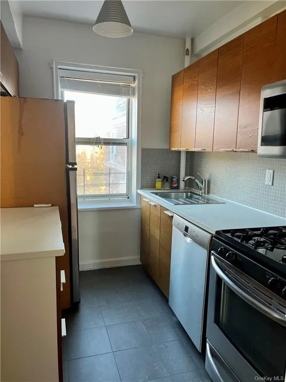 Kitchen at Unit D65 at 5440 Netherland Avenue