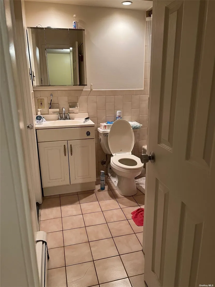 Bathroom at Unit R9 at 55-36 69th Place