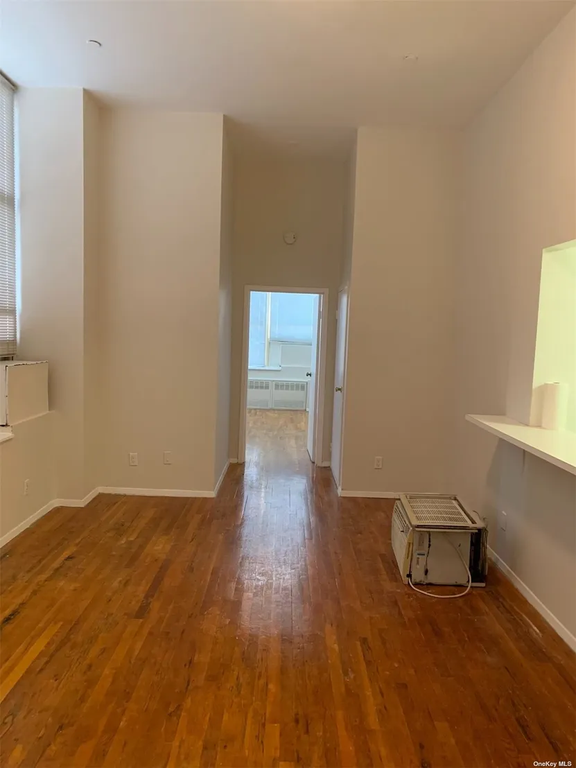 Empty Room at Unit 1R at 61-20 Woodside Avenue
