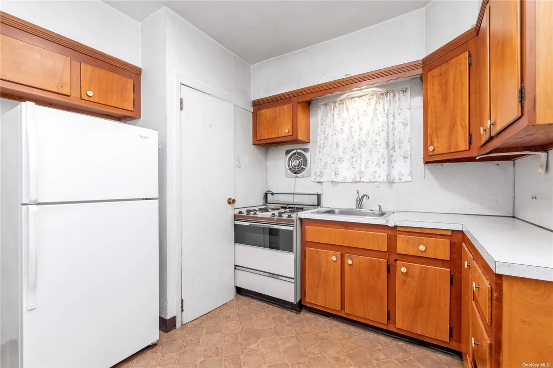 Kitchen at 209-51 34th Avenue