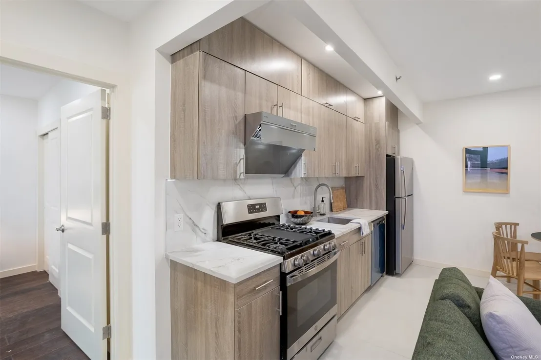Kitchen at Unit 12A at 124-28 Queens Boulevard