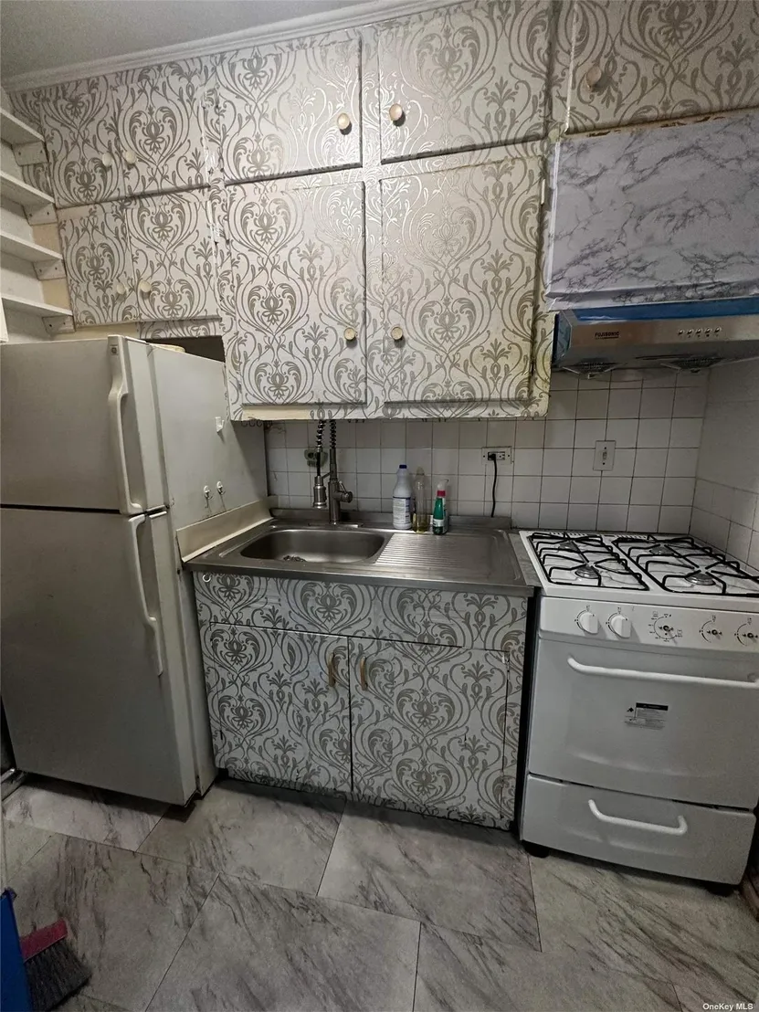 Kitchen at Unit 1A at 84-20 51 Avenue