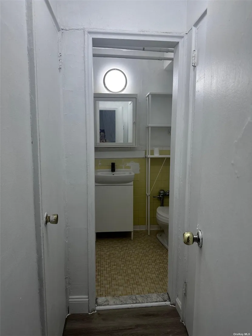 Hallway, Bathroom at Unit 1A at 84-20 51 Avenue