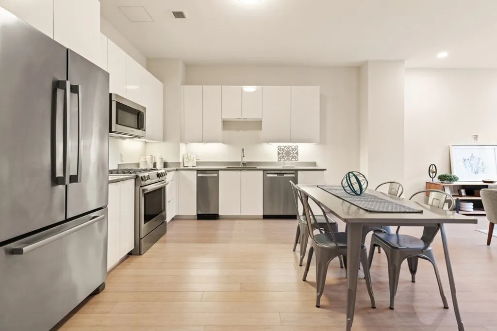 Kitchen, Dining at Unit 411 at 121 Portland St