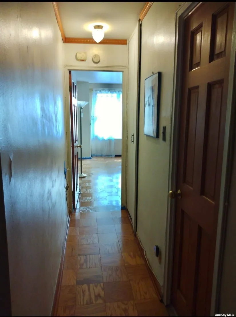 Hallway at Unit C102 at 61-20 Grand Central Parkway