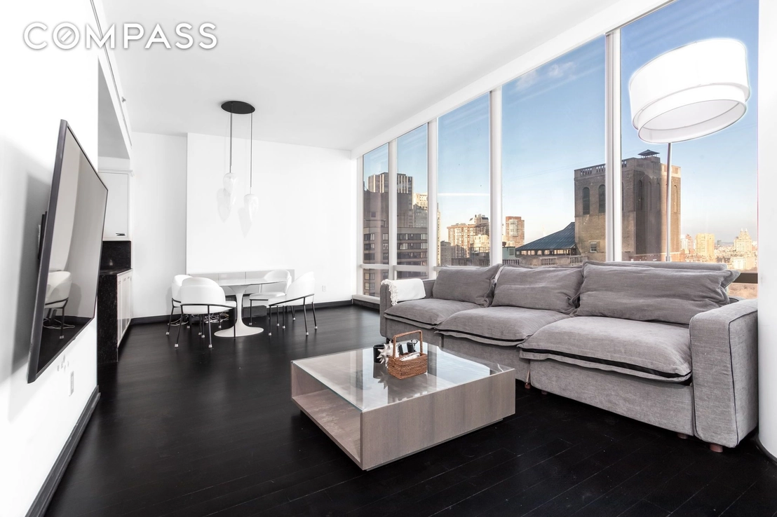 Livingroom, Dining at Unit 32A at 157 W 57th Street
