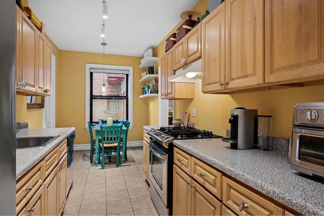 Kitchen at Unit 3T at 83-10 35TH Avenue