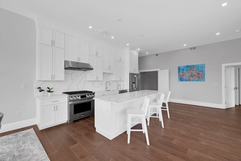 Kitchen, Dining at Unit 402 at 480 W Broadway