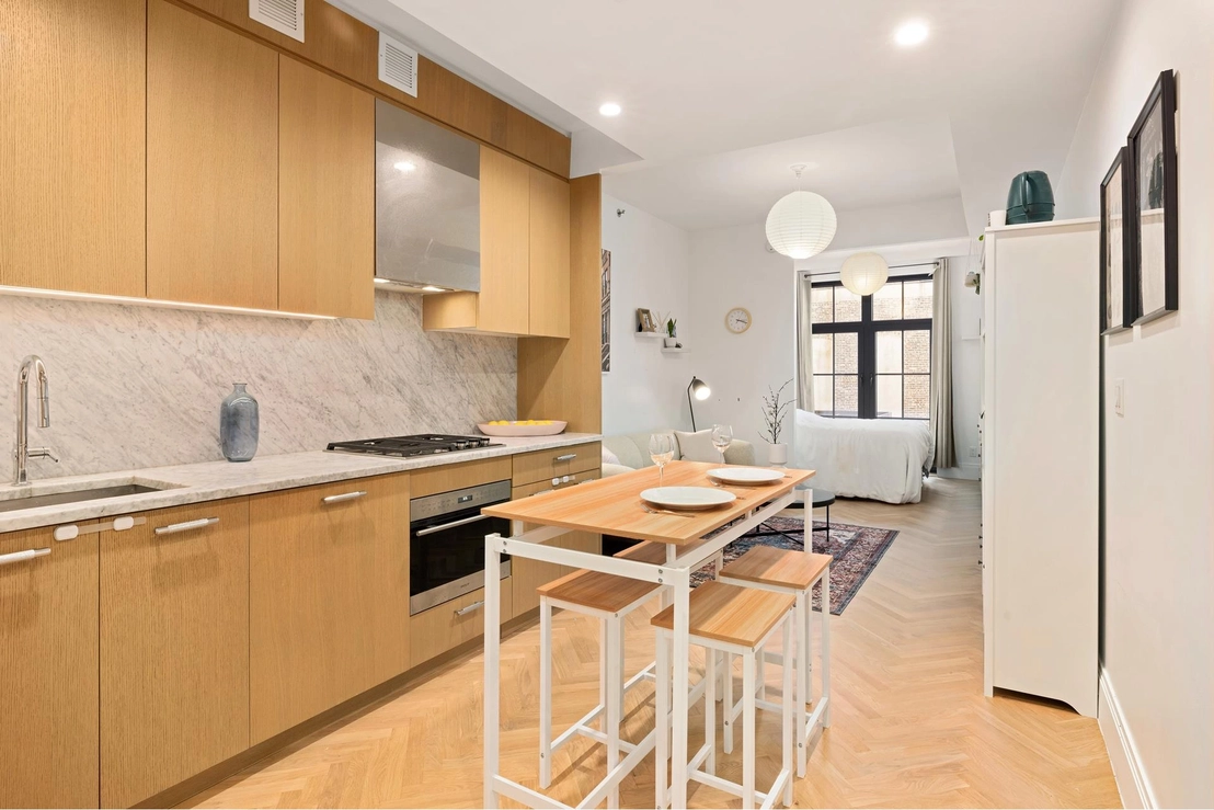 Kitchen, Dining at Unit 6Q at 300 W 122ND Street