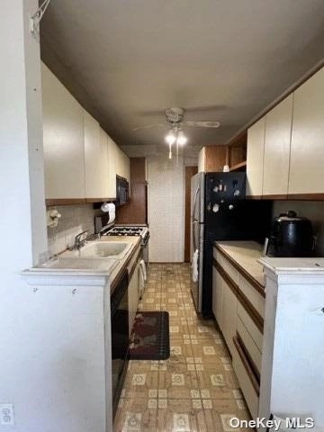 Kitchen at Unit 4M at 87-10 149th Avenue