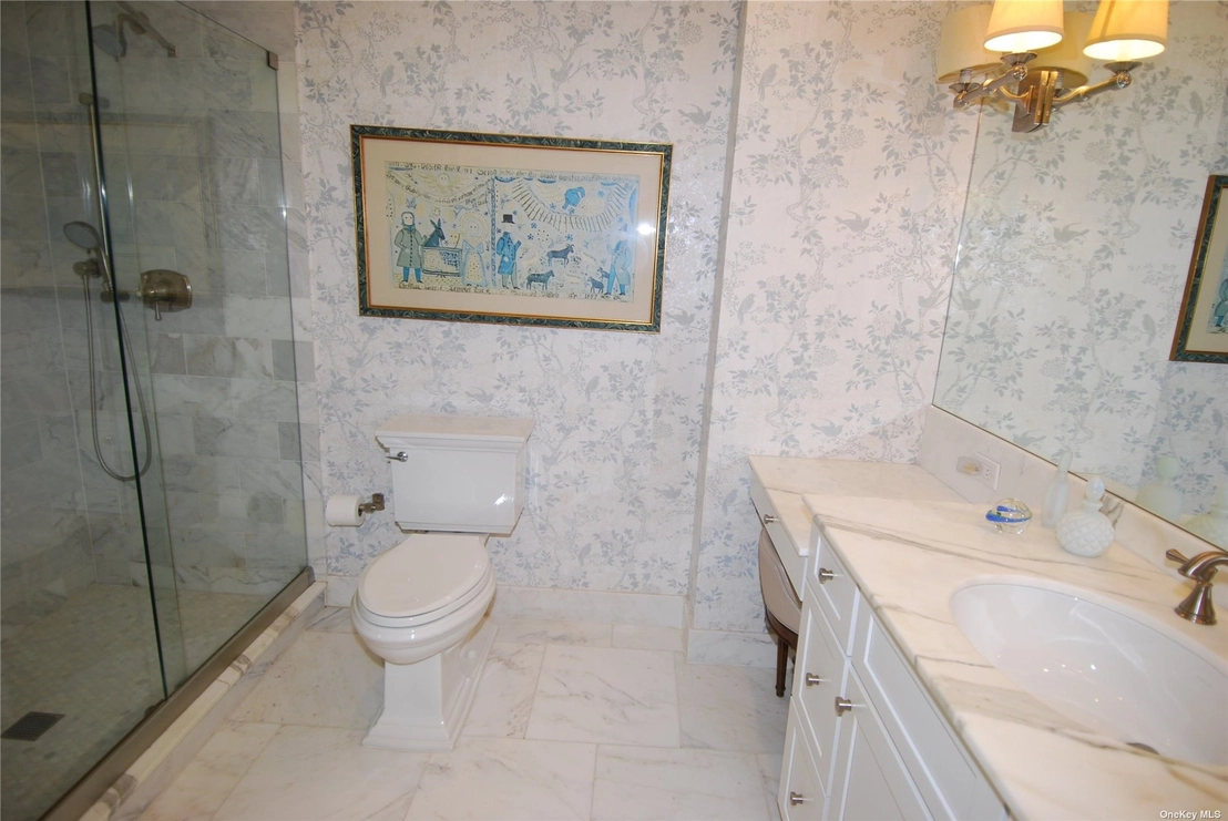 Bathroom at Unit 15L at 27110 Grand Central Parkway