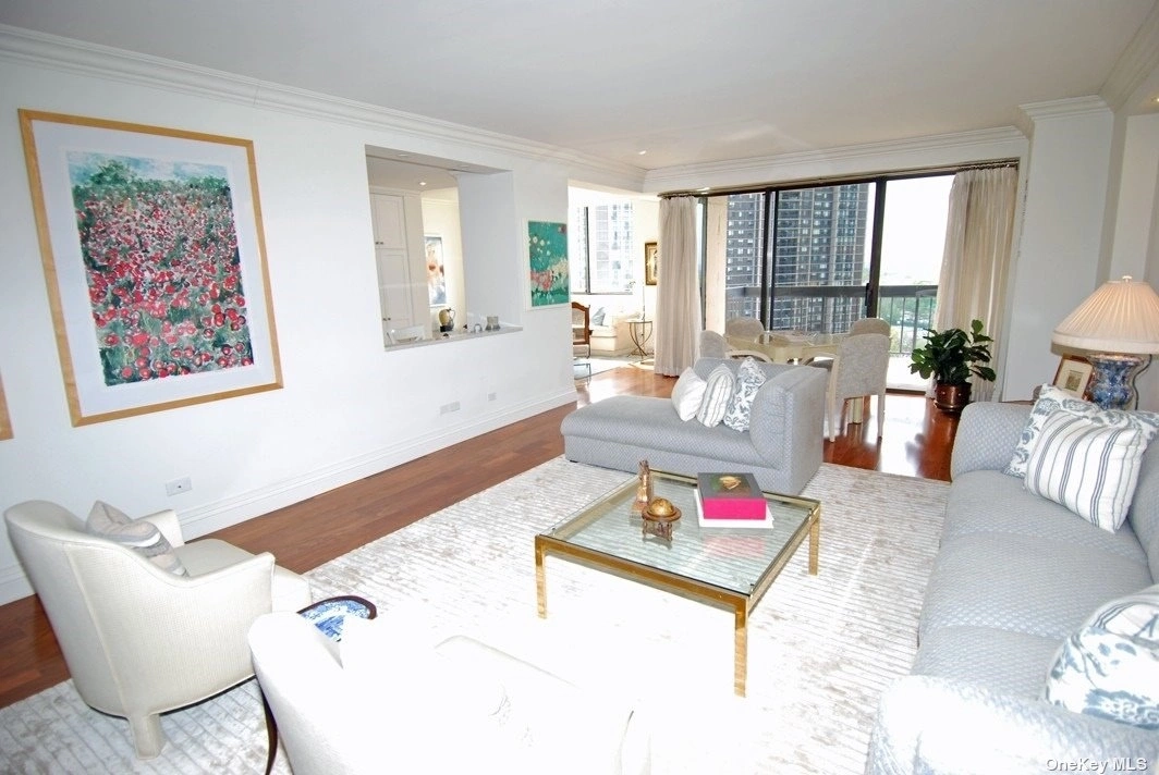 Livingroom at Unit 15L at 27110 Grand Central Parkway