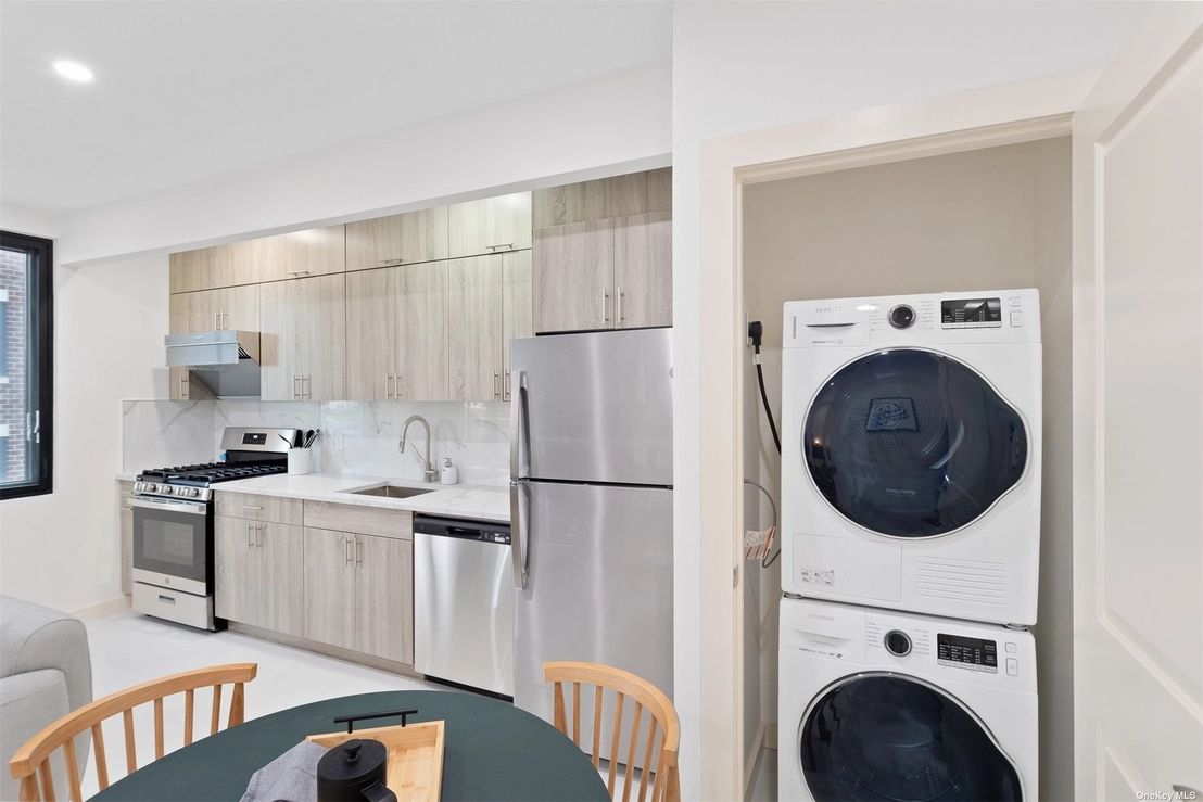 Laundry at Unit 11B at 124-28 Queens Boulevard