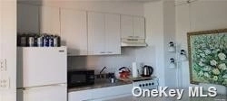 Kitchen at Unit 506 at 182-25 Wexford Terrace