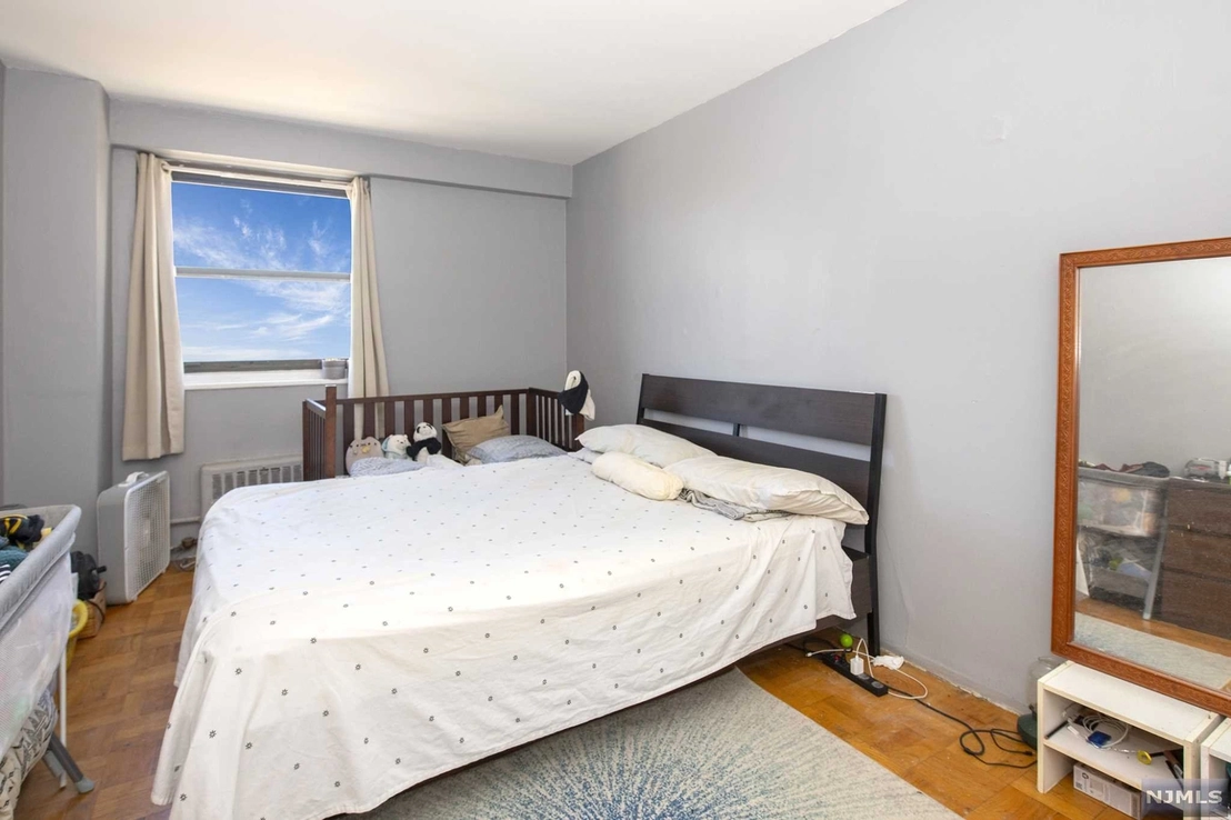 Bedroom at Unit 8E at 6515 Kennedy Boulevard