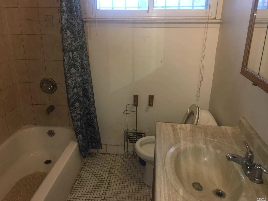 Bathroom at 202-19 120th Ave