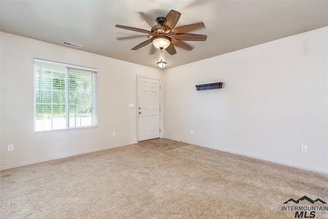 Empty Room at 9976 W Mossywood Dr