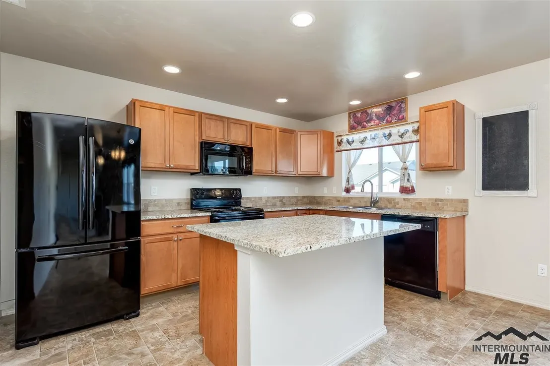 Kitchen at 9976 W Mossywood Dr