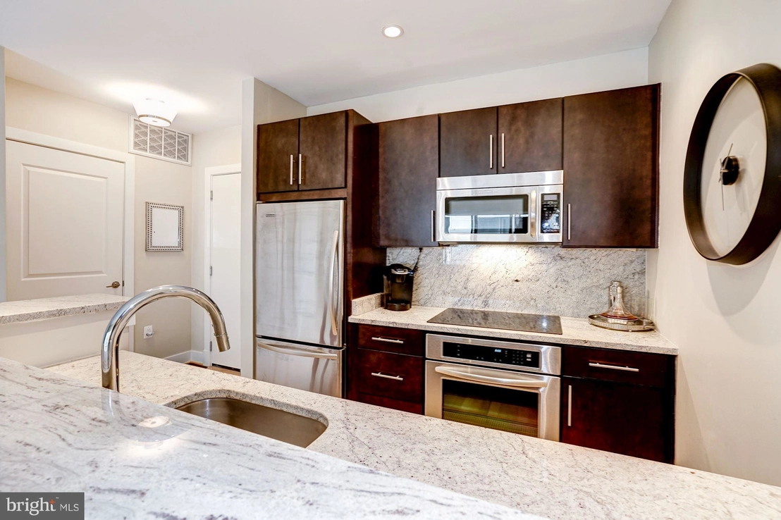 Kitchen at Unit 309 at 5201B WISCONSIN AVENUE NW