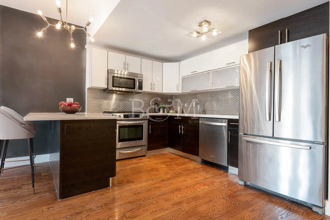 Kitchen at Unit 3 at 679 QUINCY Street