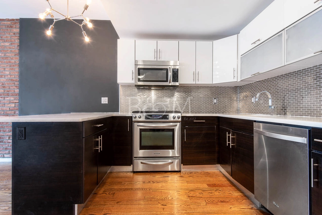 Kitchen at Unit 3 at 679 QUINCY Street