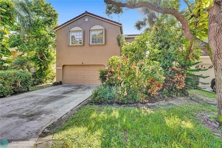 565 Nw 87th Way, Coral Springs, FL